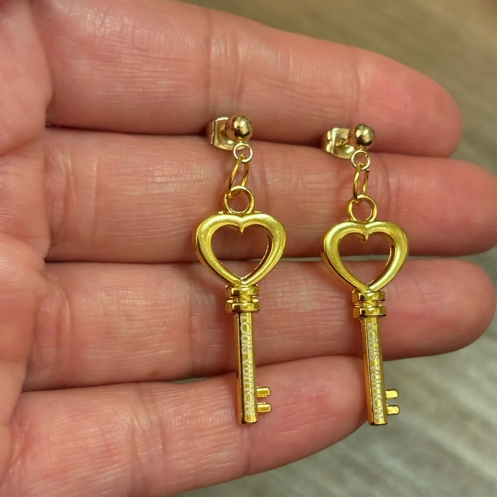 Gold lv earrings